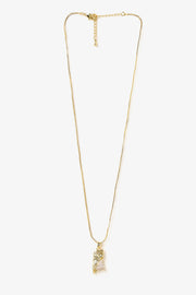 Crystal fragment pendant necklace with textured gold finish on fine chain