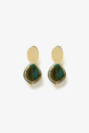 Patina Drop Earrings by Min & Lith featuring turquoise-green textured drops with earthy brown variations, gold-toned oval tops and decorative gold-toned details.
