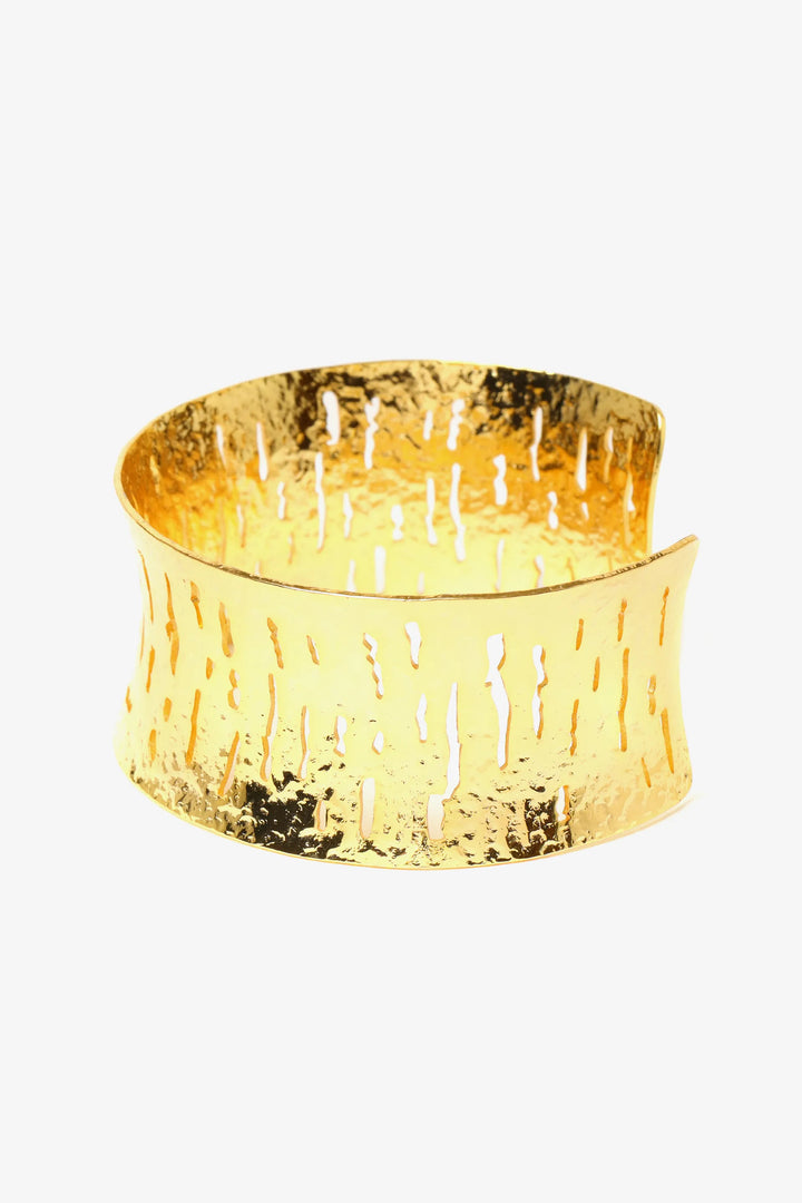 Textured relief cuff bracelet in gold with sculptural open form