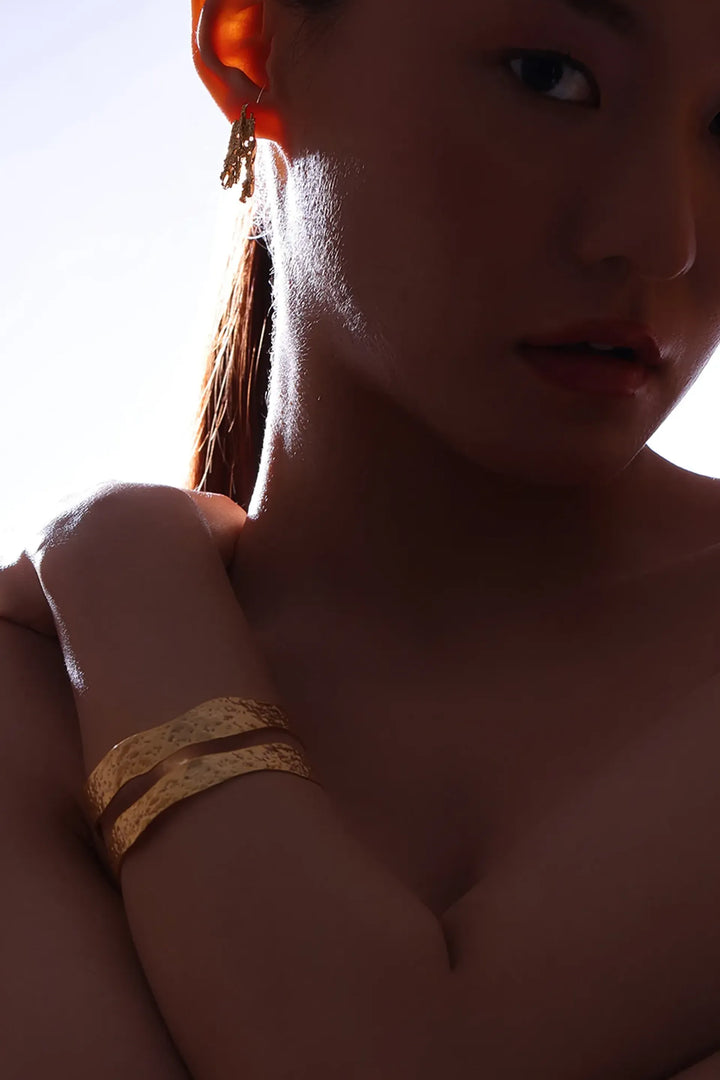 Strata split cuff bracelet in gold with textured dual band design