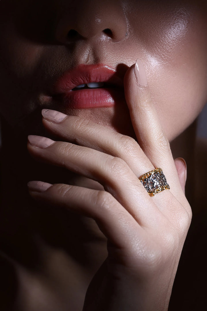 Woven element ring with textured dual tone finish in gold and silver